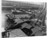 Heavy bombers on barges awaiting loading onto cargo vessel in New York harbor for shipment under provisions of the lend-lease by Anonymous