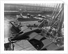 Heavy bombers on barges awaiting loading onto cargo vessel in New York harbor for shipment under provisions of the lend-lease by Anonymous