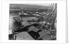 Heavy bombers on barges awaiting loading onto cargo vessel in New York harbor for shipment under provisions of the lend-lease by Anonymous