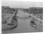 Boat on Aldebaran Canal Passing Houses in Venice, California by Anonymous