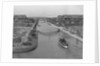 Boat on Aldebaran Canal Passing Houses in Venice, California by Anonymous