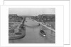 Boat on Aldebaran Canal Passing Houses in Venice, California by Anonymous