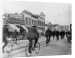 Los Angeles Police Officers Bicycling Past Broadway Storefronts by Anonymous