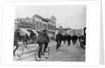 Los Angeles Police Officers Bicycling Past Broadway Storefronts by Anonymous