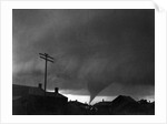 Tornado Moving Past Houses by Anonymous