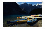 Canoes at Moraine Lake in Banff by Anonymous