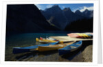 Canoes at Moraine Lake in Banff by Anonymous