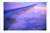 Setting Sun Hitting Airplane Wing by Anonymous