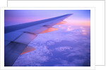 Setting Sun Hitting Airplane Wing by Anonymous