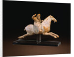 A Rare Painted Pottery Figure of a Female Polo Player by Anonymous