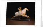 A Rare Painted Pottery Figure of a Female Polo Player by Anonymous