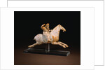 A Rare Painted Pottery Figure of a Female Polo Player by Anonymous