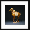 An Amber and Cream-Glazed Pottery Figure of a Horse by Anonymous