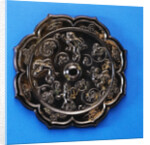 A Well-Cast Foliate Bronze Mirror. Tang Dynasty by Anonymous