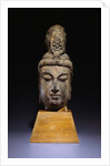 A Large Mottled Grayish Stone Head of a Bodhisattva. Tang Dynasty by Anonymous