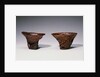 Two Chinese Rhinoceros Horn Libation Cups with Carved Designs by Anonymous