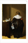 Painting of a Woman Seen From Behind and Holding a Letter by Pieter Codde