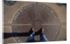 Tourist Standing on Four Corners Monument by Anonymous