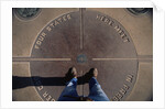 Tourist Standing on Four Corners Monument by Anonymous