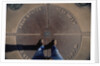 Tourist Standing on Four Corners Monument by Anonymous