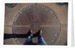 Tourist Standing on Four Corners Monument by Anonymous