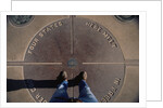 Tourist Standing on Four Corners Monument by Anonymous