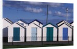 Beach Huts on Devon Town's Waterfront by Anonymous