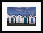 Beach Huts on Devon Town's Waterfront by Anonymous