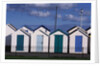 Beach Huts on Devon Town's Waterfront by Anonymous