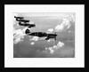 Curtiss P-40E "Warhawks" in Flight by Anonymous