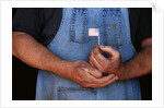 Man Holding Small American Flag by Anonymous