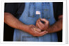 Man Holding Small American Flag by Anonymous
