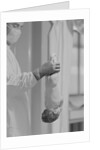 Doctor Holds New Born Baby by his Feet by Anonymous