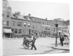 Merchant Walking Across Street by Anonymous