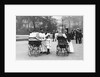 Nannies and Children Strolling in Park by Anonymous