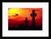 Celtic Crosses Silhouetted at Sunset by Corbis