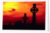 Celtic Crosses Silhouetted at Sunset by Corbis