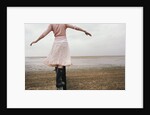 Woman Balancing on a Breakwater by Anonymous