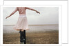 Woman Balancing on a Breakwater by Anonymous