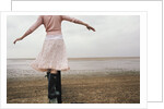 Woman Balancing on a Breakwater by Anonymous