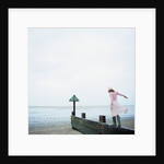 Woman Balancing on a Breakwater by Anonymous