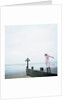 Woman Balancing on a Breakwater by Anonymous