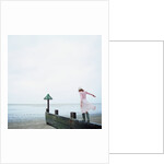 Woman Balancing on a Breakwater by Anonymous