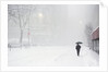 Pedestrian Walking Along Snowy Street by Anonymous