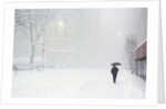 Pedestrian Walking Along Snowy Street by Anonymous
