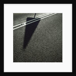 Shadow of Sign on Road by Anonymous