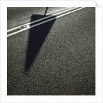 Shadow of Sign on Road by Anonymous