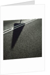 Shadow of Sign on Road by Anonymous