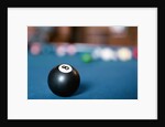Eight ball on pool table by Anonymous