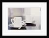 Two coffee cups on a table by Anonymous